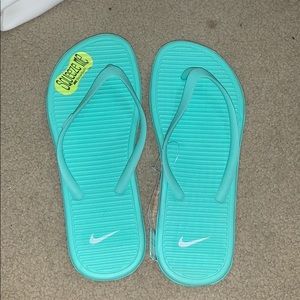 Nike Solarsoft flip flops